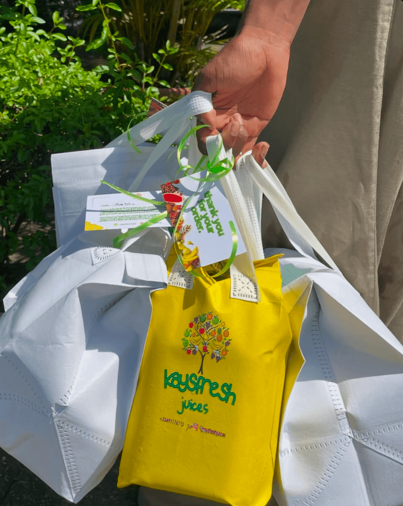 An order bagged with a thank-you card, ribboned and ready to hand over